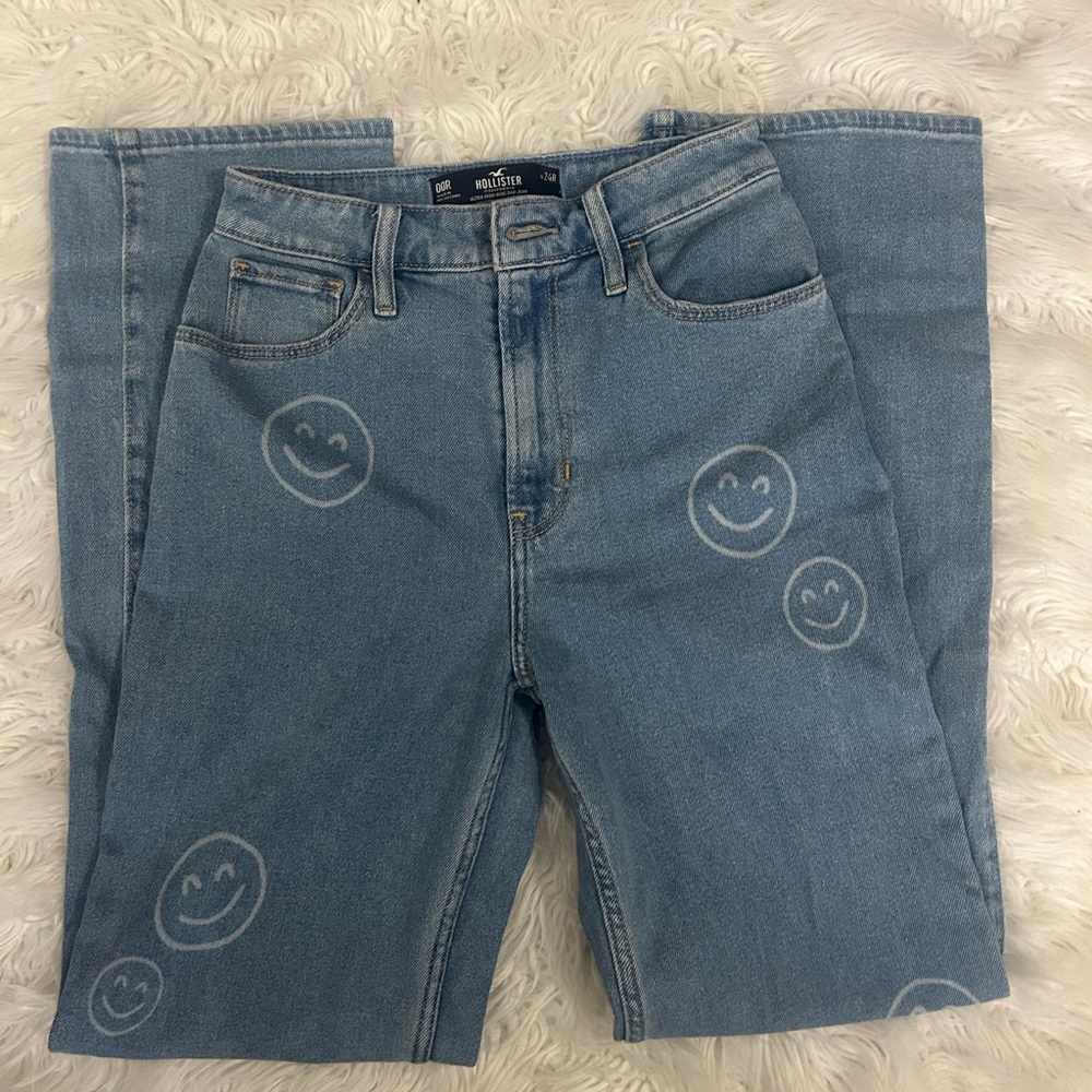 Hollister Women's Light Blue Straight Leg Jeans with Smiley Pattern